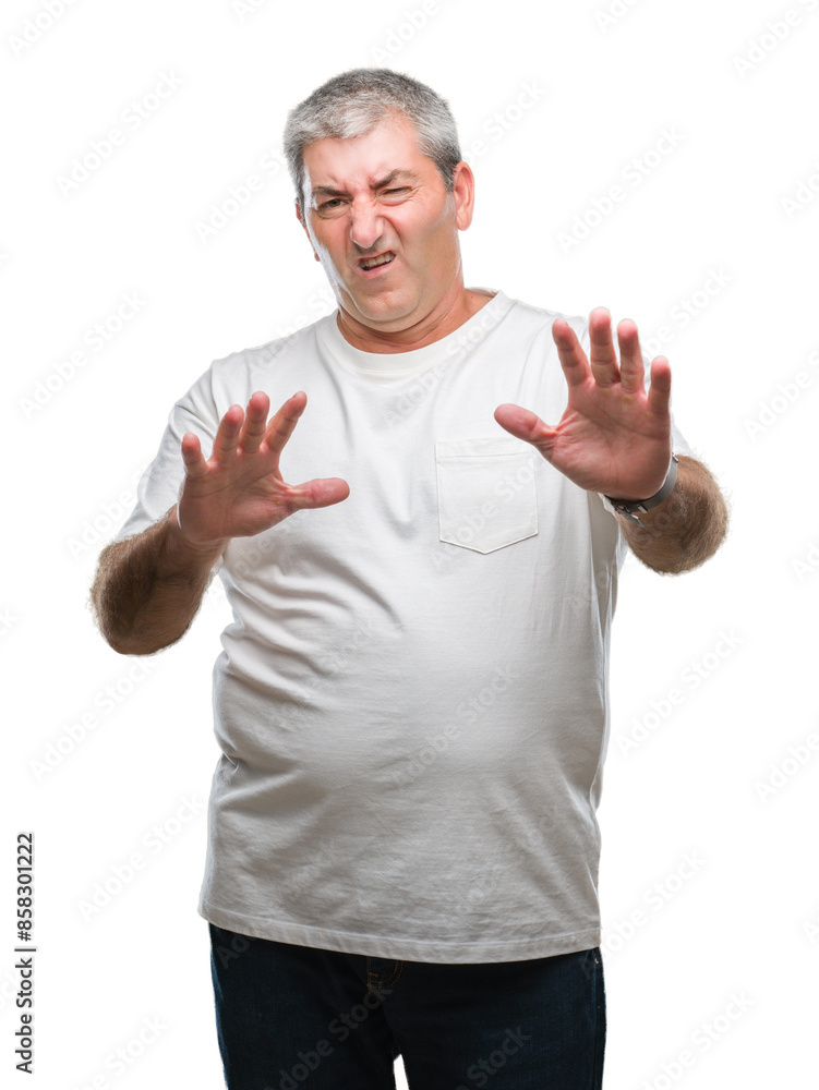 Sticker Handsome senior man over isolated background afraid and terrified with fear expression stop gesture with hands, shouting in shock. Panic concept.