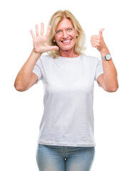 Middle age blonde woman over isolated background showing and pointing up with fingers number six while smiling confident and happy.