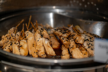 Teriyaki chicken skewers. Traditional Japanese food - skewer yakitori with chicken hearts and teriyaki sauce.