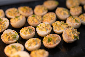 Deviled eggs at a party on a tray