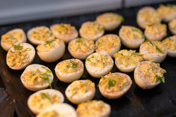 Deviled eggs at a party on a tray