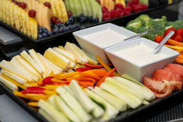 Mixed vegetable tray and dip. Variety of fresh vegetables at an event with ranch dip
