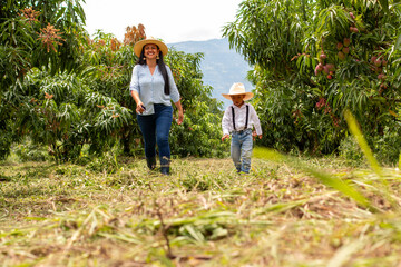 lifestyle: mother and son with down syndrome go for a walk in the countryside