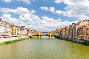 Famous medieval stone bridge Ponte Vecchio over Arno river in Florence, Tuscany, Italy