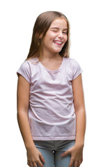Fototapeta premium Young beautiful girl over isolated background winking looking at the camera with sexy expression, cheerful and happy face.