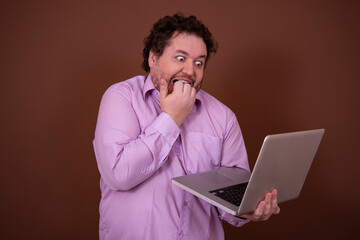 Funny fat man and online dating. Brown background.