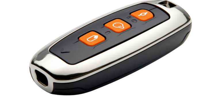 Close-up of a black and silver remote control with orange buttons.