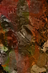 Artist's palette, palette knife painting. Abstract background with many different colors and paint stains