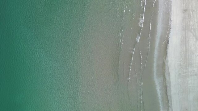 Waves crashing on the paradisiacal beach