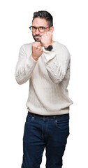 Young handsome man wearing glasses over isolated background Ready to fight with fist defense gesture, angry and upset face, afraid of problem