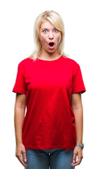 Young beautiful blonde woman wearing red t-shirt over isolated background afraid and shocked with surprise expression, fear and excited face.