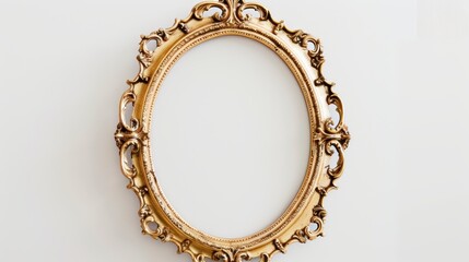 Ornate gold oval frame on white wall