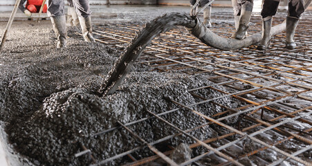 Workers work on concrete concreting floors of buildings in construction site, Concept pouring...