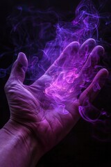 A person's hand with purple smoke emerging from the fingers, possibly used in fantasy or sci-fi illustrations