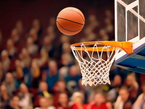 Scoring the winning points at a basketball game