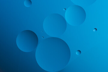 Abstract blue background with dynamic circles of different sizes.