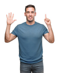 Handsome young casual man showing and pointing up with fingers number six while smiling confident and happy.
