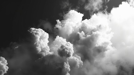Black and white cumulus clouds in a sky