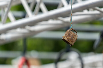 A bell of a hanging obstacle in an obstacle course race