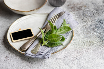 Elegant summer table setting with a fresh mint theme