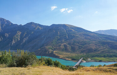 A bridge over a distant mountain