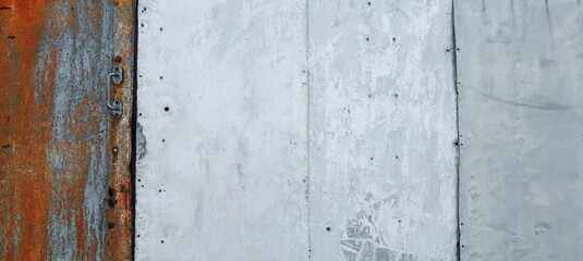 Rustic Elegance: Weathered Blue Metal Door. The Allure of Faded Paint and Oxidized Surfaces in an Industrial Setting