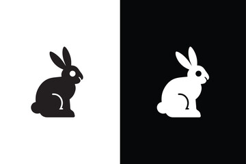 Black white side silhouette of a rabbit isolated on white black background.
