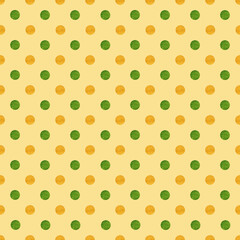 Abstract polka dot seamless pattern. Orange and green watercolor textured dots on yellow background. Colorful dotted pattern. Retro seamless pattern for textiles, wrapping paper, scrapbook, wallpaper.