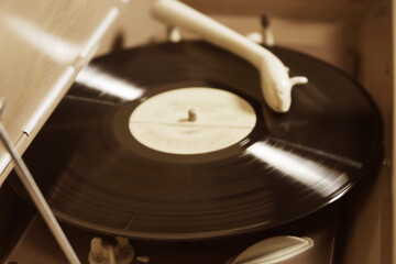 Rotation of a vinyl in vintage radio gramophone 1960s
