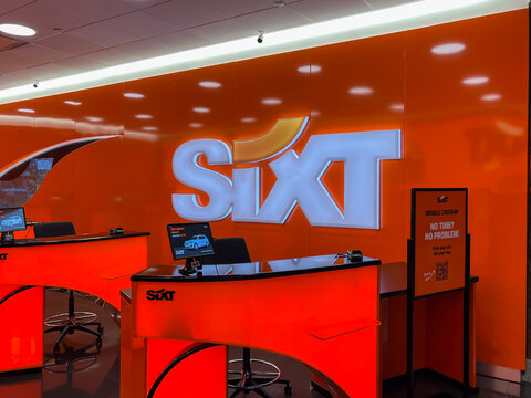 Houston, Texas, USA - April 1, 2024: SIXT car rental counter at an airport. Sixt SE is an international mobility service provider.