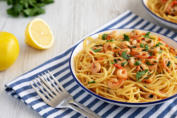 Homemade Garlic Shrimp Scampi with Parsley on a Plate, low angle view.