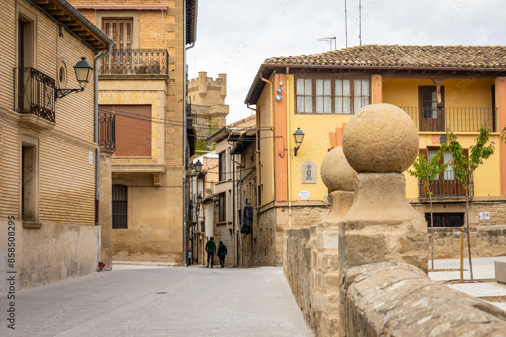 Wall mural a narrow street with typical houses in Olite town, province of Navarra, Spain