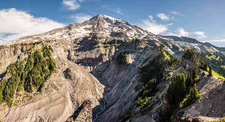 River Rushes Through Deep Gorge Below Mount Rainier