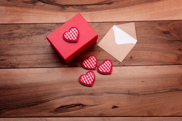 red heart on wooden background