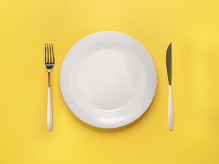 Empty plate on yellow background