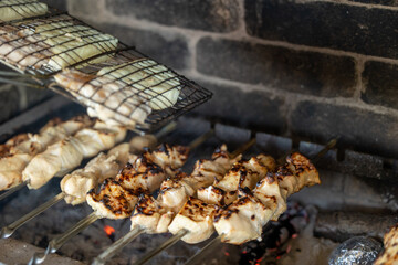 Chicken meat roasting on the grill