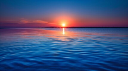 Obraz premium Peaceful Sunset Reflection Over Still Water