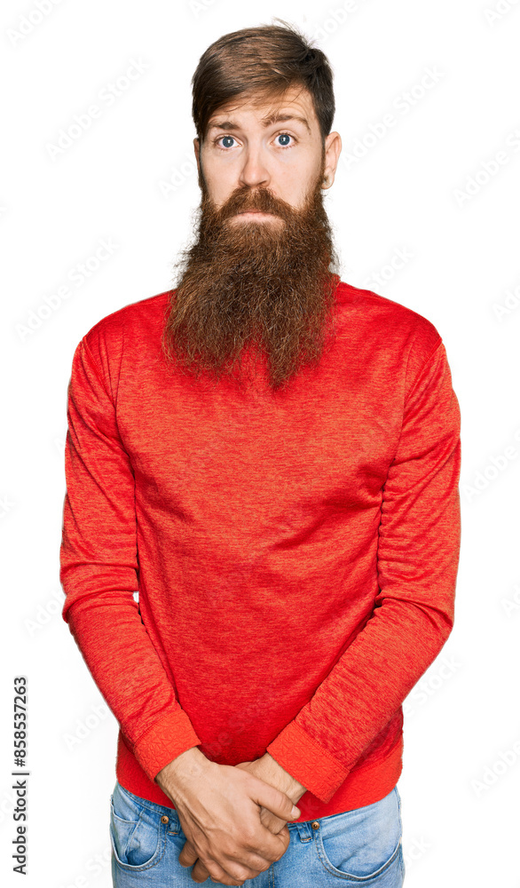 Poster redhead man with long beard wearing casual clothes depressed and worry for distress, crying angry an