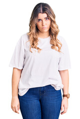 Fototapeta premium Young caucasian woman wearing casual clothes skeptic and nervous, frowning upset because of problem. negative person.