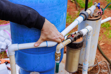 Water is being connected to water supply well system pump house