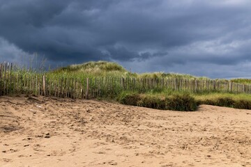 sand dunes and clouds