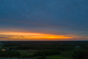Fiery sunset, colorful clouds in the sky. Aerial of Cloud with sunset sky background