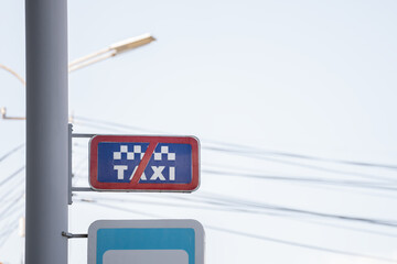 A sign for not parking a taxi