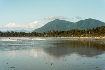 Mountain reflection off the beach at Cox Bay in Tofino, BC 