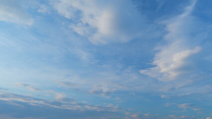 Dynamic cloud time-lapse from calm blue skies to cloudy. Puffy fluffy white clouds. Time lapse.