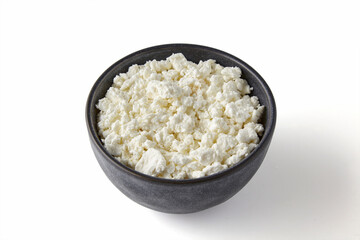 Cottage cheese in a ceramic bowl isolated on a white background. High angle view