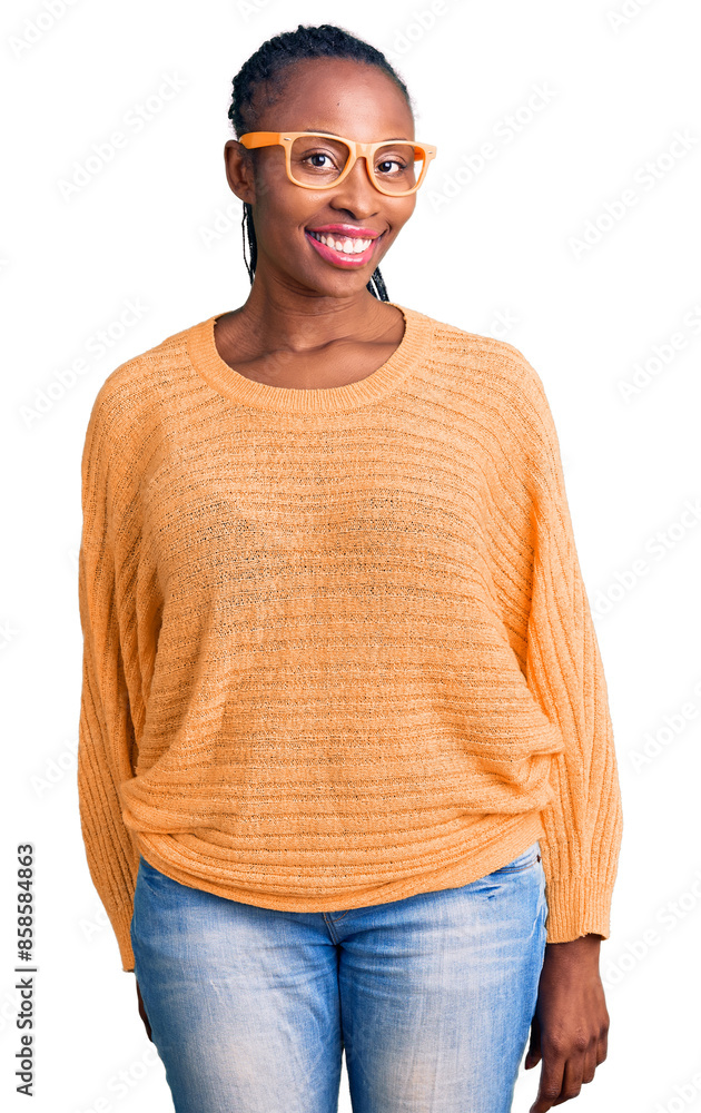 Canvas Prints Young african american woman wearing casual clothes and glasses looking positive and happy standing and smiling with a confident smile showing teeth