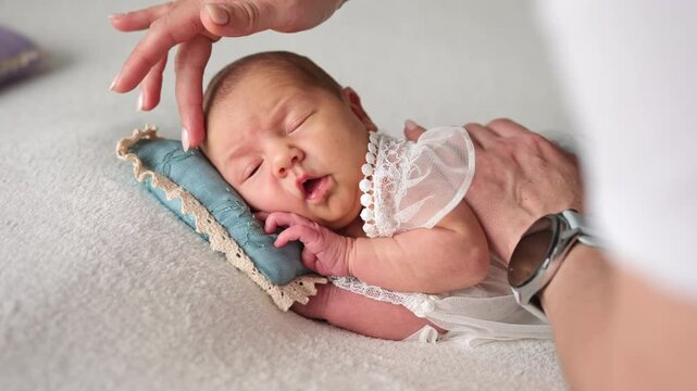 Caring Mom Gently Caressing Her Cute Newborn Baby, Lulling To Sleep