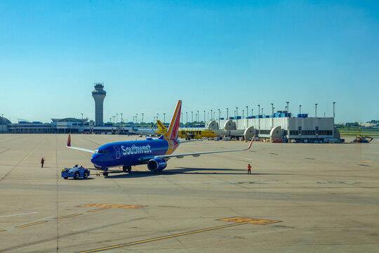Control tower at St. Louis Lambert International Airport (STL) with Southwest plane in foreground