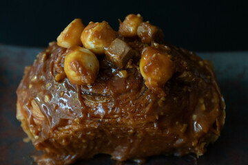 Dessert Concept, Coffee Break , Tea-Time , Coffee Cake topped with Macadamia nuts